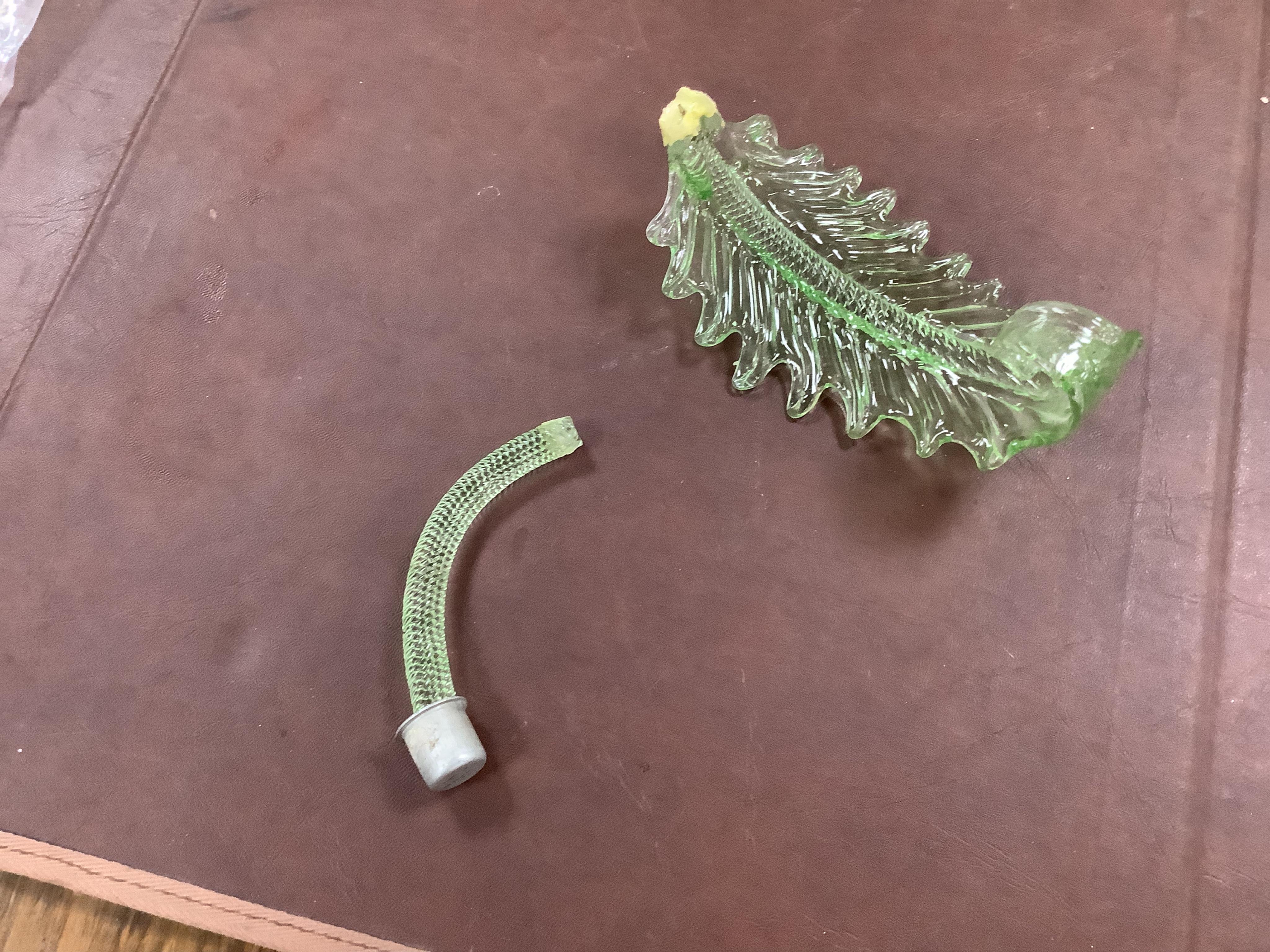 An ornate leaf and floral green glass Murano three branch chandelier, 84cm high.